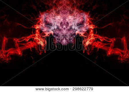 Red  And Blue Cloud Of Smoke Of  Black Isolated Background In The Form Of A Skull, Monster, Dragon O