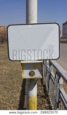 The Power Button Traffic Lights At The Crosswalk With A Blank Sign. On An Empty Sign Can Be Applied 