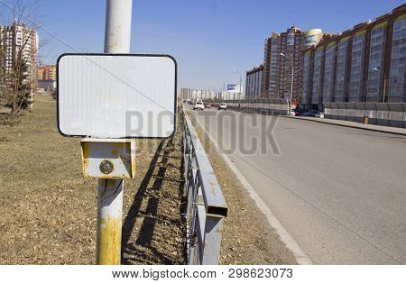 The Power Button Traffic Lights At The Crosswalk With A Blank Sign. On An Empty Sign Can Be Applied 