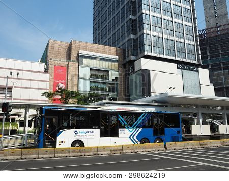 Jakarta, Indonesia - April 17, 2019: Transjakarta Bus Getting Some Passengers At Bundaran Hi Bus She