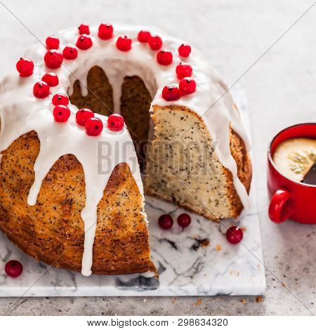 Sliced Lemon Poppy Seed Bundt Cake With Sugar Glaze And Redcurrant, Square