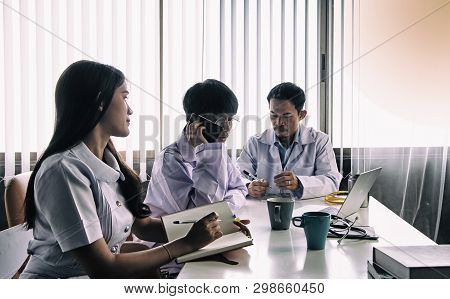 The Abstract Artdesign Background Of Two Doctors And Nurse Meeting Together,consulting About Treatme