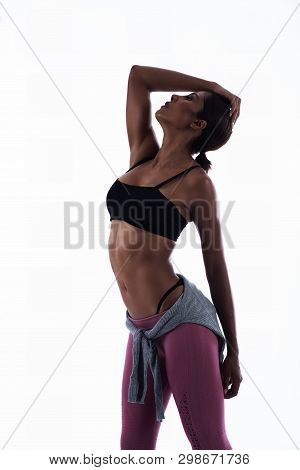 The Beauty Woman Wearing Exercise Suit,raise Hand Tocuh Her Neck And Turn Face Up In The Air,show He