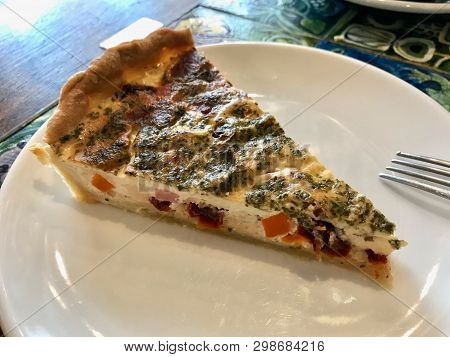 Quiche Tart Kis / Vegetable Pie Slice Served With Plate At Restaurant.