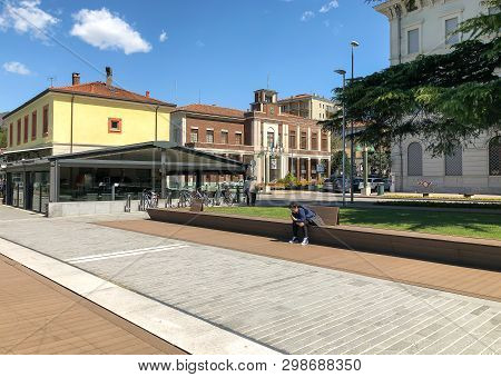 Luino, Lombardy, Italy - April 30, 2019: People Walking Along The Luino, Lakefront On The Coast Of L