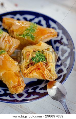 Asian Dessert Baklava Or Pahlava On A Traditional Oriental Plate, Great Image For Your Needs.
