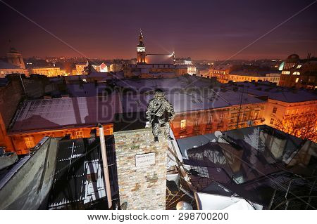 Statue Of Chimney Sweep Winter Night Lviv, Ukraine