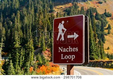 Naches Loop Sign With Autumn Colors In Background