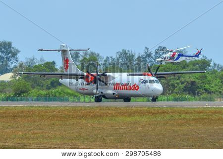 Airplane Taxiing On Runway