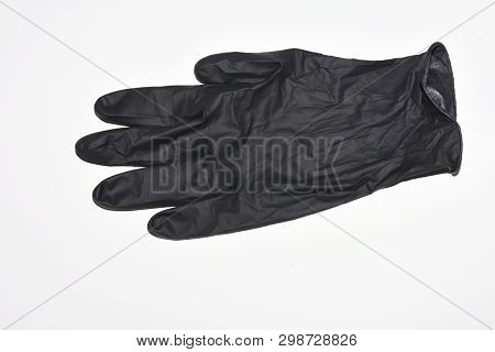 Black Nitrite Glove,isolated On White With Clipping Path