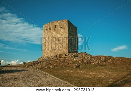 Stone Squared Tower Over Rocky Hill