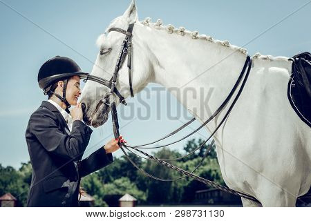 Nice Beautiful Woman Standing In Front Of Her Horse
