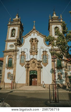 Church In Baroque Style And Leafy Tree