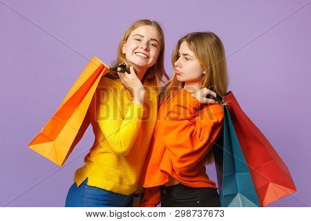 Two Pretty Young Blonde Twins Sisters Girls In Vivid Clothes Hol