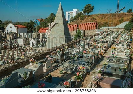 Guarda, Portugal - July 21, 2018. Cemetery With Crypts And Marble Tombs Decorated By Flowers At Guar