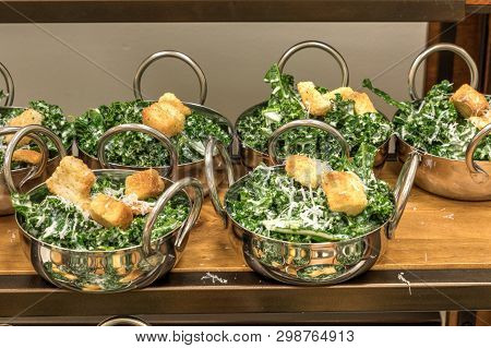 Kale Caesar With Croutons Salad In A Single Serving For A Light Lunch.