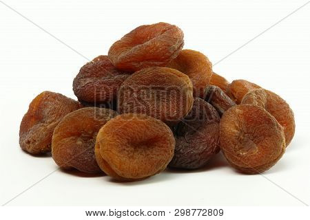 Stack Of Sundried Apricots (isolated On White Background)