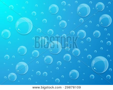 Gotas de agua sobre fondo azul.