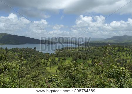 Mountains And River Water Landscape With Clouds At Satara, Maharashtra, India.