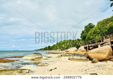 Coastline Of Praslin, Tropical Beach With Big Granite Rocks , An