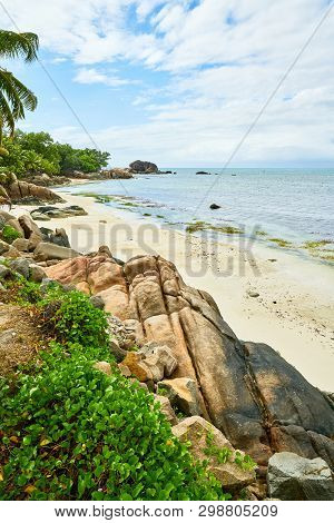 Coastline Of Praslin, Tropical Beach With Big Granite Rocks , An