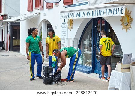 Saint-jean-de-luz, France - June 22, 2018: Merry Fans Of The Brazilian Soccer Team Staged A Musical 