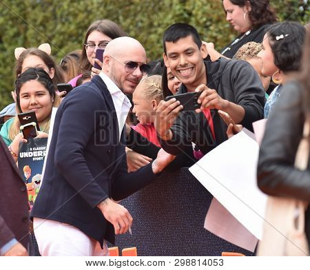 LOS ANGELES - APR 27:  Pitbull aka Armando Christian Perez arrives for the 'Ugly Dolls' World Premiere on April 27, 2019 in Los Angeles, CA                