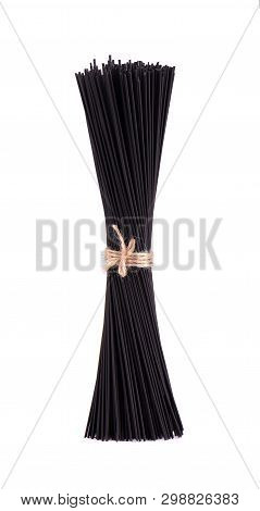 Black Spaghetti With Squid Ink, Isolated On White Background. Pasta With Black Cuttlefish Ink.