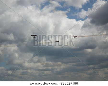 On A Collision Course. Demonstration Flights Of Sports Aircraft During The Aviation Festival.