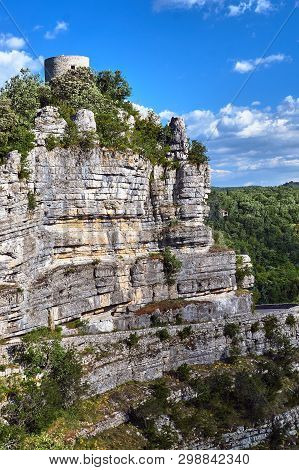 A Medieval Tower On The Top Of The Rock In Town Balazuc In France