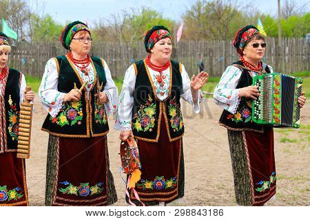 Petrikovka, Dnepropetrovsk Region, Ukraine, 28 04 2019. Elderly Women In National Ukrainian Costumes