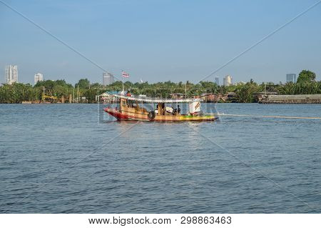 Samut Prakan,thailand. April 27, 2019 : A Local Boat With Thai Flag In Chao Phraya River. Bang Krach