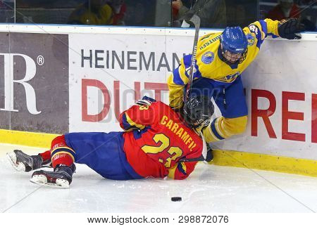 Kyiv, Ukraine - April 20, 2018: Raul Caramfil Of Romania (l) Fights For A Puck With Artem Tselogorod