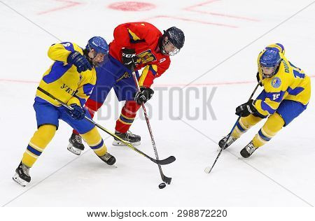 Kyiv, Ukraine - April 20, 2018: Cristian Boldizsar Of Romania (c) Fights For A Puck With Stanislav S