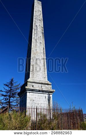 A View Of A Memorial Obelisk On The Summit Of Dun More Hill In The Perthshire Town Of Comrie
