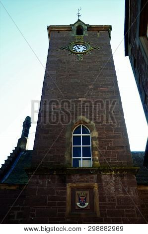 An Exterior View Of The Clock Tower On The Town Hall Building In Crieff, Perthshire