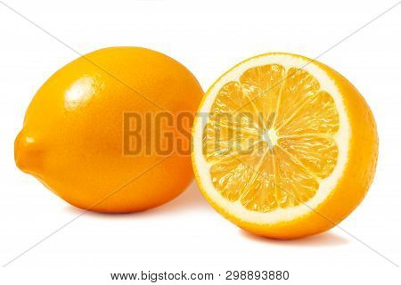 Fresh Orange Tashkent Lemons Or Meyer Lemons, One Whole And One Half Isolated On White Background Wi