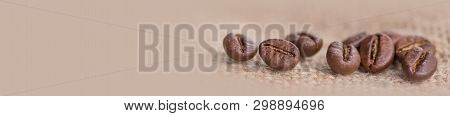Cloceup Of Brown Roasted Coffee Beans Seeds On Burlap Textile Background Black Caffeine Drink And En
