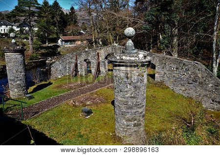 A View Of The Old Stone Entrance Gateway To The Clan Mcnabb Burial Grounds At Killin In Rural Stirli