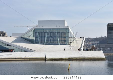 1 March 2019, Oslo, Norway, Oslo Opera House. People Visit Oslo Opera House In Norway. The Building 