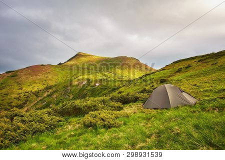 Grey Big Tent By The Lake In The Carpathians