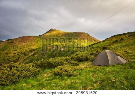 Grey Big Tent By The Lake In The Carpathians
