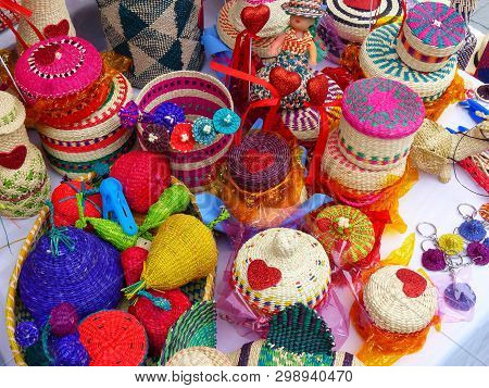 Various Wicker Souvenirs - Baskets, Dolls, Bottles, Vases, Hats And More - Made From Toquilla Straw,