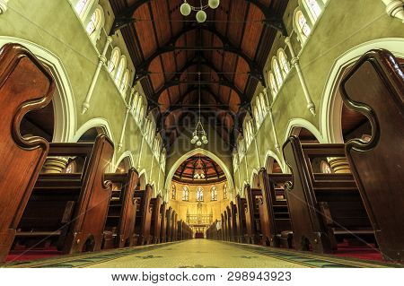 Armidale, Australia - April 10, 2019: View Of The Stunning Interior And Superb Cedar Pews Of Saints 