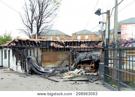 LONDON/ UK- 29th April 2019: Damage caused to a garage and car, after a major fire, in Chadwell heath, Dagenham, east London.