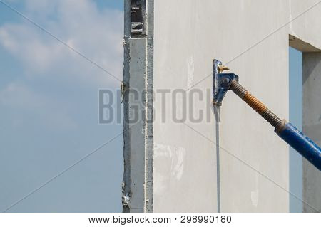 Steel Use For Cling On The Precast Concrete Wall, Installation Of Prefabricated House.