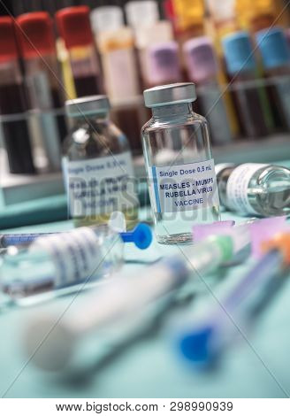 Different Vials Of Triple Viral Vaccine Of Measles, Rubella And Mumps, Known As Mmr, Conceptual Imag