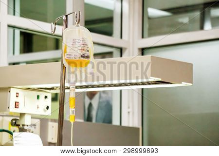 Blood Platelet In A Medical Bag And Medical Labels Hanging On A Pole And Transferring To A Sick Newb