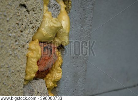 Joining The Masonry Using Assembly Polyurethane Foam Causes Unsightly Bumps Which On The Sun Gradual