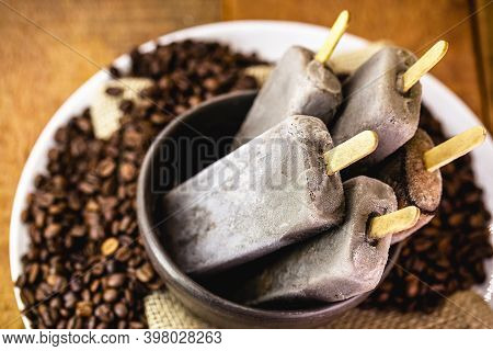 Bowl With Coffee Flavored Popsicles. Cold Dessert, Cappucino Popsicle, Pop Ice